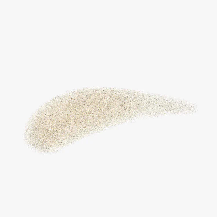 Shimmery body oil swatch with fine glitter on a white background