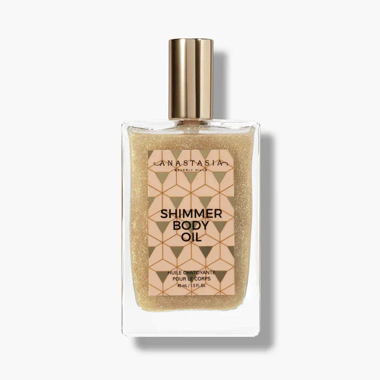 Anastasia Beverly Hills Shimmer Body Oil in a gold, geometric glass bottle