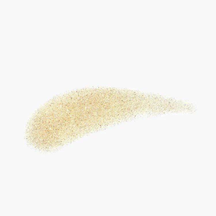 Gold shimmer loose powder swatch on white background, luxury makeup highlighter