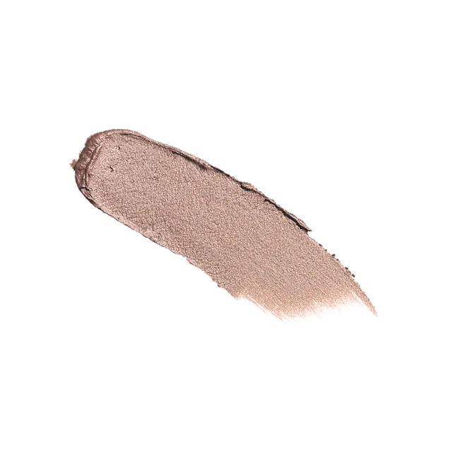Creamy champagne eyeshadow swatch with a shimmery, metallic finish on white background