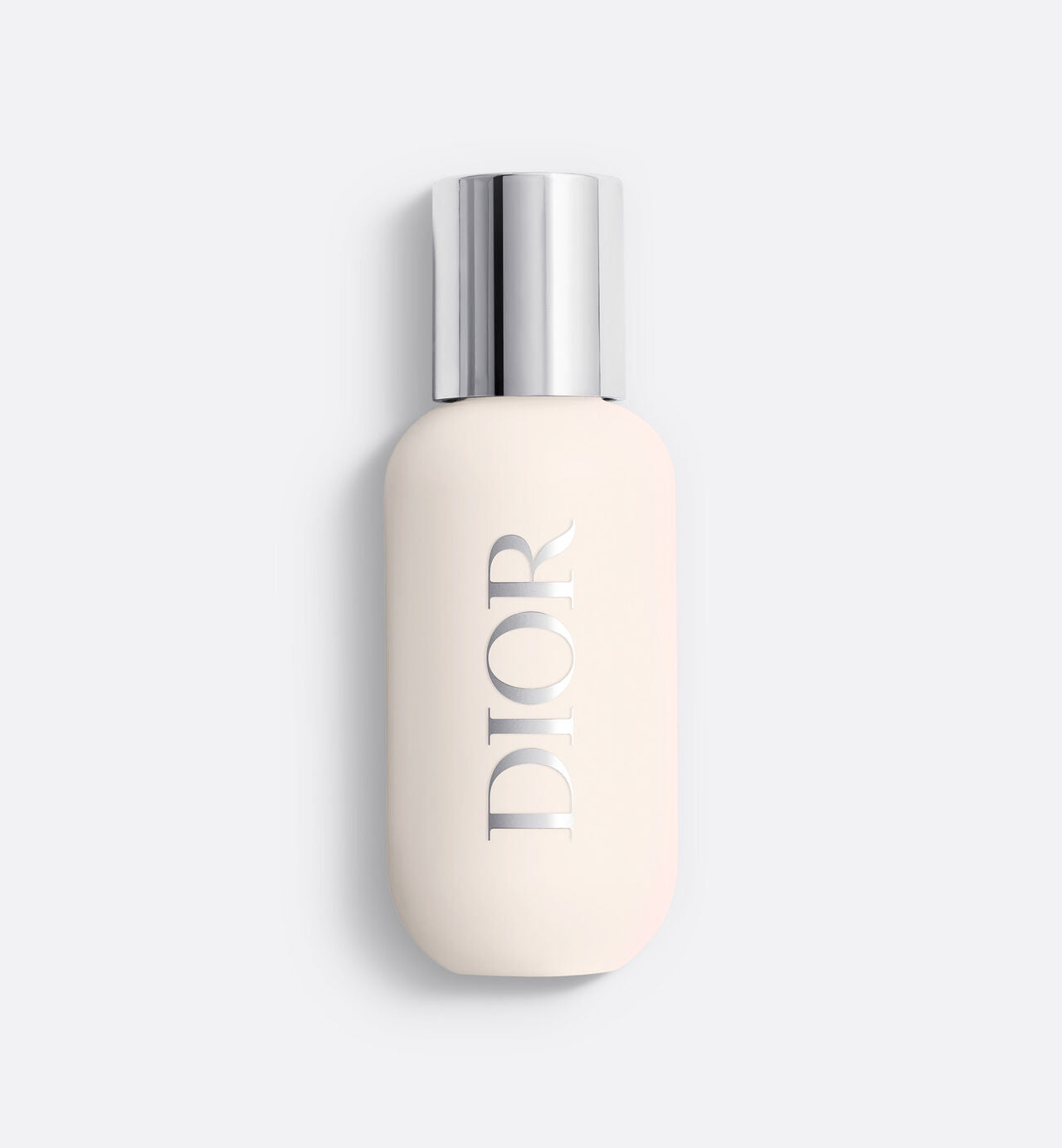 Elegant white Dior bottle with silver cap, luxury skincare product on a plain background
